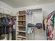 Walk-in closet features shelving and ample space for storage and organization at 5424 E Florian Ave, Mesa, AZ 85206