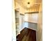 Organized walk-in closet featuring custom shelving and hanging rods for ample storage at 5749 S 247Th Dr, Buckeye, AZ 85326