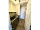 Functional laundry room features modern washer and dryer and overhead lighting at 5749 S 247Th Dr, Buckeye, AZ 85326