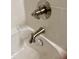 Close-up of a modern shower fixture with chrome finish and white tiled walls at 5749 S 247Th Dr, Buckeye, AZ 85326