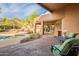 A covered patio area featuring a refreshing pool and desert views at 5892 E Carefree Mountain Dr, Carefree, AZ 85377