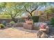 A tranquil outdoor seating area with desert landscaping and scenic views at 5892 E Carefree Mountain Dr, Carefree, AZ 85377