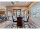 Dining area showcases a decorative rug, seating for four, and access to a view of the outdoors at 5892 E Carefree Mountain Dr, Carefree, AZ 85377
