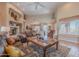 Open-concept living room featuring comfortable seating, high ceilings, and plenty of natural light at 5892 E Carefree Mountain Dr, Carefree, AZ 85377