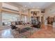 Beautiful living room with high ceilings, niches, comfortable seating, and desert views at 5892 E Carefree Mountain Dr, Carefree, AZ 85377