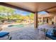 Inviting pool area set against a backdrop of desert landscape, perfect for outdoor relaxation at 5892 E Carefree Mountain Dr, Carefree, AZ 85377