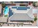 Aerial view showcasing the home's layout, solar panels, pool and landscaping at 729 W Silver Reef Dr, Casa Grande, AZ 85122