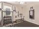 Exercise room with weights, exercise bike, mirror, and neutral paint at 729 W Silver Reef Dr, Casa Grande, AZ 85122