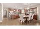 Spacious kitchen and dining area with modern appliances and stylish tile flooring throughout at 729 W Silver Reef Dr, Casa Grande, AZ 85122