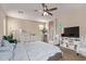Spacious main bedroom with a ceiling fan, and an assortment of furniture at 729 W Silver Reef Dr, Casa Grande, AZ 85122