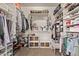 Organized walk-in closet with shelving and hanging space for clothes and accessories at 729 W Silver Reef Dr, Casa Grande, AZ 85122