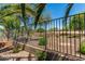 Fenced backyard with desert landscaping, offering a private outdoor space at 7365 W Magdalena Ln, Laveen, AZ 85339