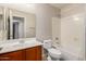 Full bathroom offering a tub-shower combination and a vanity with ample counter space at 7365 W Magdalena Ln, Laveen, AZ 85339