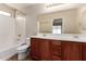 Spacious bathroom with a double sink vanity and a tub-shower combination at 7365 W Magdalena Ln, Laveen, AZ 85339