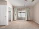 Bedroom offering closet space and a sliding door accessing the backyard at 7365 W Magdalena Ln, Laveen, AZ 85339