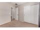 Bedroom with a closet and an ensuite bathroom providing space and convenience at 7365 W Magdalena Ln, Laveen, AZ 85339