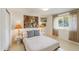 Bright bedroom with natural light, decorative lamps, and accent art at 7719 N 17Th Ave, Phoenix, AZ 85021