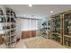 Spacious walk-in closet with built-in shelving for ample storage and organization at 7719 N 17Th Ave, Phoenix, AZ 85021