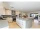 Open kitchen featuring stainless steel appliances, stylish countertops, and an oversized center island at 7719 N 17Th Ave, Phoenix, AZ 85021