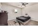 Bedroom includes a window for natural light and laminate flooring at 7746 W Osborn Rd, Phoenix, AZ 85033