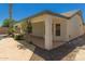 Covered patio in the backyard featuring concrete columns and views of the private outdoor area at 7924 W Hammond Ln, Phoenix, AZ 85043