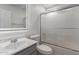 Bathroom features a marble sink, LED mirror and a shower with frosted glass at 7924 W Hammond Ln, Phoenix, AZ 85043