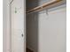 This walk-in closet features ample storage space with a rod and shelf at 7924 W Hammond Ln, Phoenix, AZ 85043