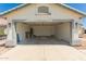 Attached two-car garage features ample space and an automatic door at 7924 W Hammond Ln, Phoenix, AZ 85043