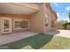 Outdoor patio with artificial grass in a well-kept backyard at 10226 E Pine Valley Rd, Scottsdale, AZ 85255