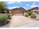 Charming single-story home with a well-maintained driveway and desert landscaping at 10226 E Pine Valley Rd, Scottsdale, AZ 85255
