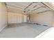 Spacious garage with built-in cabinets and room for storage at 10226 E Pine Valley Rd, Scottsdale, AZ 85255