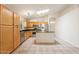 Bright kitchen boasts stainless steel appliances and a central island at 10226 E Pine Valley Rd, Scottsdale, AZ 85255