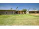 Expansive backyard features lush green grass and an oversized lot, ideal for outdoor activities at 10643 W Pineaire W Dr, Sun City, AZ 85351