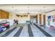 Spacious two car garage featuring ample storage space and washer and dryer at 10643 W Pineaire W Dr, Sun City, AZ 85351