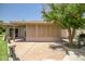 Large covered patio for outdoor entertaining and a citrus tree in the backyard at 10643 W Pineaire W Dr, Sun City, AZ 85351