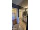 This bathroom features granite countertops, white cabinets, and an adjacent walk-in closet and bathroom at 11026 N 28Th Dr # 34, Phoenix, AZ 85029