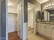 The well-lit bathroom boasts granite countertops, double sinks, and a shower/tub combo at 11026 N 28Th Dr # 34, Phoenix, AZ 85029