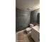 Bathroom with a toilet, sink, granite countertop and grey walls at 11026 N 28Th Dr # 34, Phoenix, AZ 85029