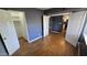 Bedroom with wood floors, closet, and grey walls at 11026 N 28Th Dr # 34, Phoenix, AZ 85029