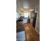 This kitchen features granite countertops, stainless steel appliances, and a stacked washer/dryer unit at 11026 N 28Th Dr # 34, Phoenix, AZ 85029