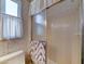 Bathroom with shower and a patterned towel at 111 S Greenfield Rd # 531, Mesa, AZ 85206