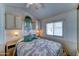 Cozy bedroom featuring a plush bed, built-in storage, and a sunlit window at 111 S Greenfield Rd # 531, Mesa, AZ 85206