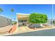 Inviting home featuring well-maintained landscaping, driveway and covered parking at 111 S Greenfield Rd # 531, Mesa, AZ 85206