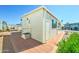 Charming exterior of the home with brick accents, landscaped surroundings, and community access at 111 S Greenfield Rd # 531, Mesa, AZ 85206