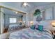 Relaxing main bedroom with a large mirror and a plush bed with decorative pillows at 111 S Greenfield Rd # 531, Mesa, AZ 85206