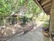 Inviting backyard offers lush trees providing ample shade, and lush landscaping at 1118 E Orangewood Ave, Phoenix, AZ 85020