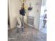 Inviting entryway with neutral paint, carpet, and decor provides a comfortable welcome at 1118 E Orangewood Ave, Phoenix, AZ 85020