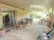 Wide covered patio space with ample room for outdoor living and backyard access at 1118 E Orangewood Ave, Phoenix, AZ 85020