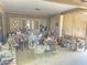 Covered patio with brick pillars and concrete floor offers ample space at 1118 E Orangewood Ave, Phoenix, AZ 85020