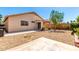 A large backyard with patio and minimal landscaping for the new homeowner to design at 11182 W Coronado Rd, Avondale, AZ 85392